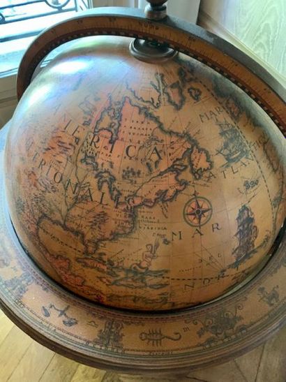 A world map forming a liquor cellar, the...