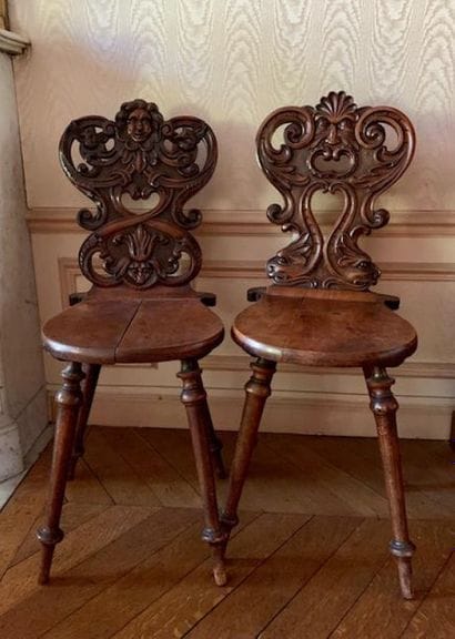 Two walnut caquetry chairs, the openwork...