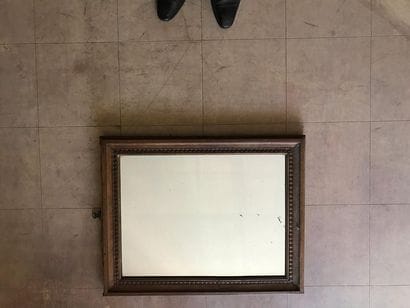 Mirror with a wooden surround with a patina...