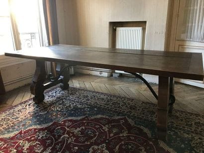 Large rustic table in natural wood, the scroll...