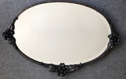 Mirror with oval wrought iron frame with...