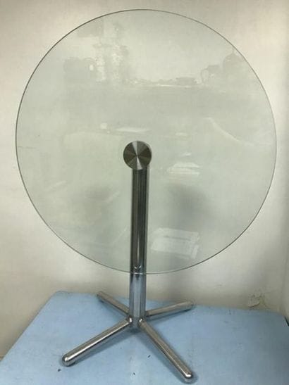 Table, the round glass top, the chromed metal...