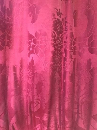 Two pairs of red damask silk curtains decorated...
