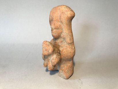 Terracotta indole with a character presenting...