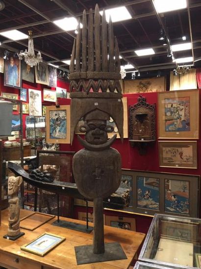Roof finial made of faded carved wood.
KANAK,...