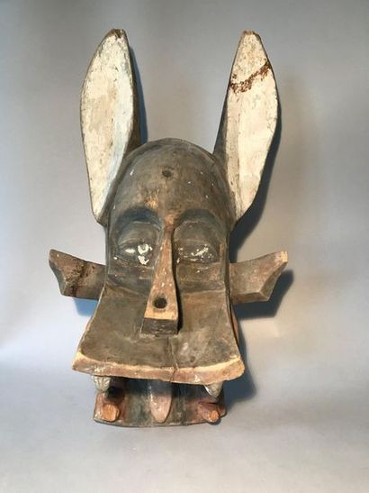 Fire-eater mask made of carved and partially...