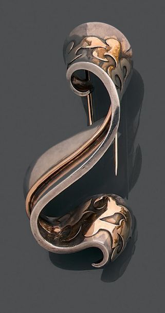 Clip de revers en or jaune 18K (750) et argent...