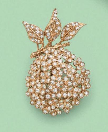 Clip articulé en or jaune 18K (750), figurant...