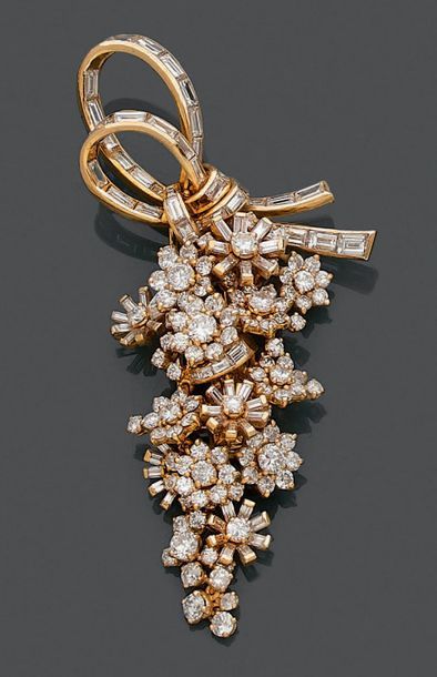 Clip de revers en or jaune 18K (750), figurant...