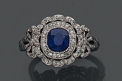 Bague à monture en or jaune et or gris 18K...