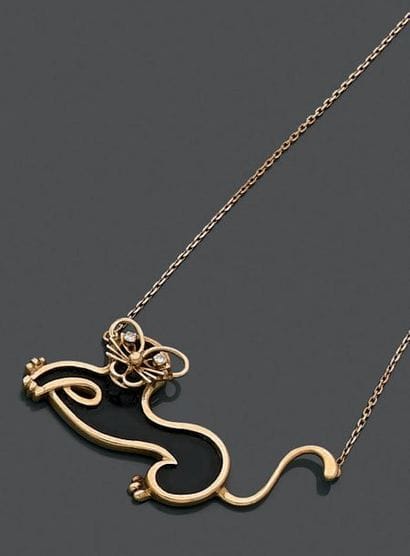 Pendentif représentant un chat stylisé en...