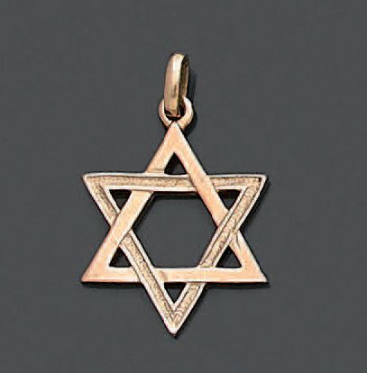 Pendentif en or jaune 14K (585), figurant...