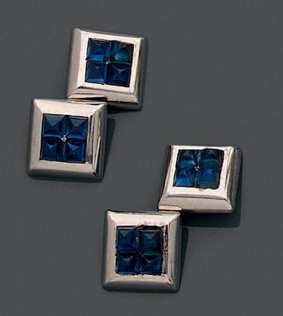 Paire de boutons de manchette en or gris...