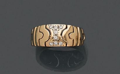 Bague jonc en or jaune 18K (750), dessinant...