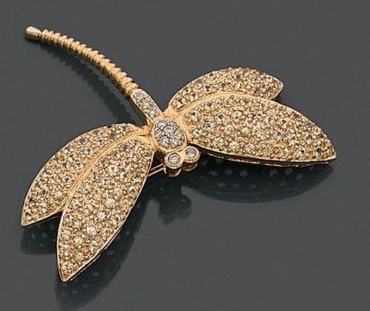 Broche en or jaune 18K (750), figurant une...