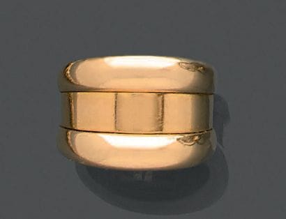 Bague en or jaune 18K (750), l'anneau bordé...