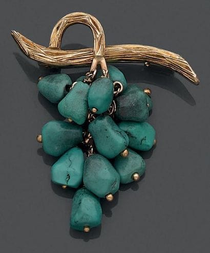Broche articulée en or jaune 18K (750), figurant...