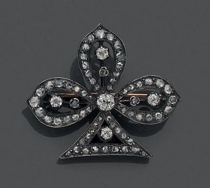 Broche en or jaune 18K (750) et argent (800),...