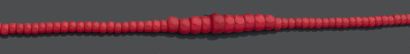Collier de boules de corail en chute. Le...