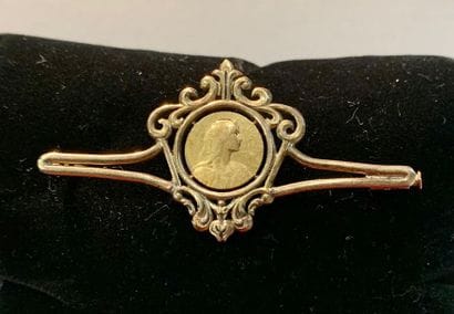 Broche barrette en or jaune 18K (750), ornée...