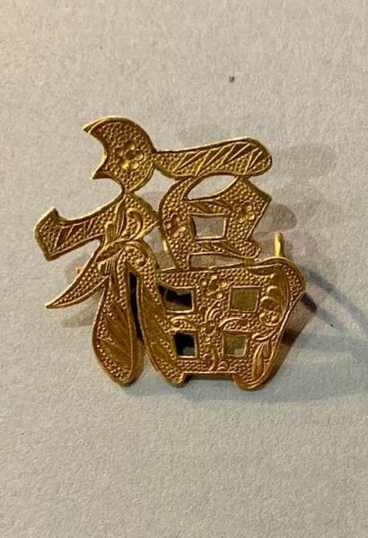 Broche en or jaune 14K (585), figurant un...