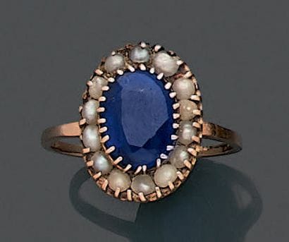 Bague à monture en or jaune 18K (750), ornée...