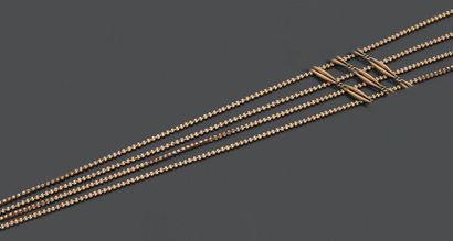 Longue chaîne giletière en or jaune 18K (750),...