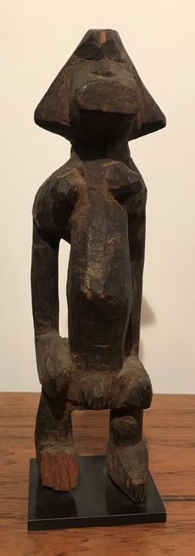 Wooden standing figure. 
Senoufo people....
