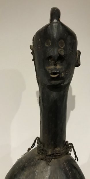 Statue of a standing figure with arms detached...