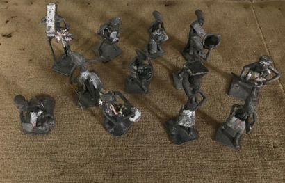 Suite of twelve African metal figurines enhanced...