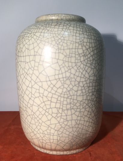 Cream glazed crackle ceramic vase. 
Top....