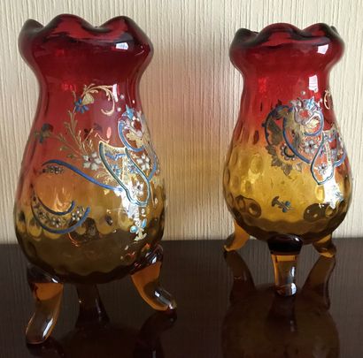 Pair of red and amber glass tripod vases,...