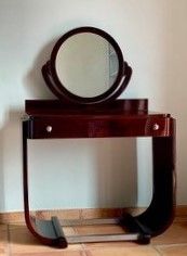 Coiffeuse en palissandre et placage de palissandre....
