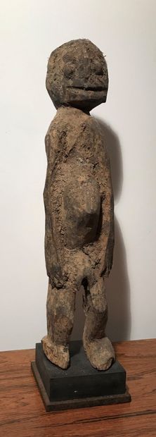 Wooden statue. Lobi people. Burkina Faso....