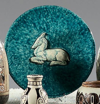 M.R.:
Ceramic bowl glazed cream and nuanced...