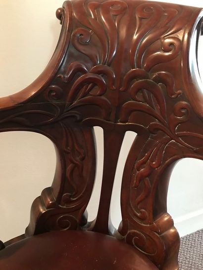 Mahogany boat armchair molded and carved...
