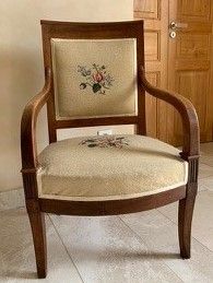 Pair of walnut armchairs, the back slightly...