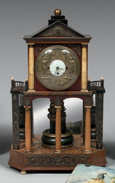 Portico clock in mahogany and ornamentation...