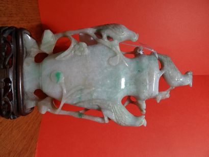 CHINE - XXe siècle.
A celadon and rust nephrite...