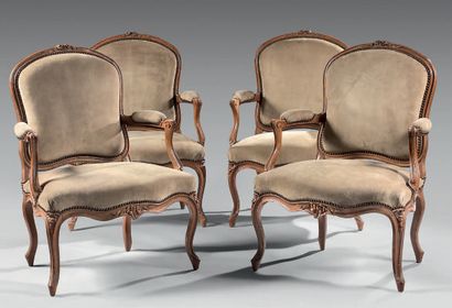 Suite of four armchairs in natural wood,...
