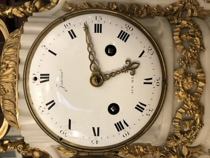 White marble and gilt bronze clock. The dial...