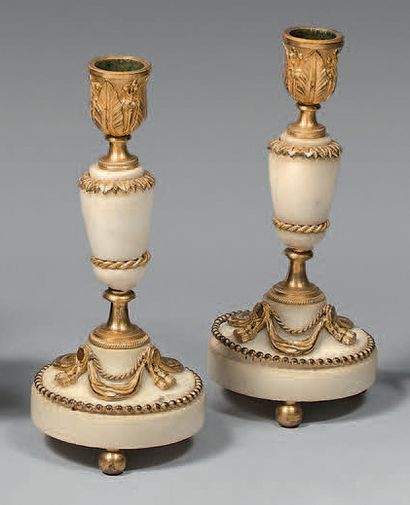 Pair of white marble and gilt bronze torches,...
