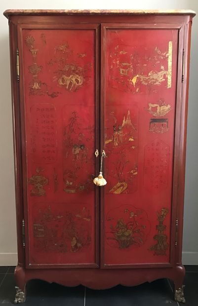 A lacquered wood cabinet, the two doors and...