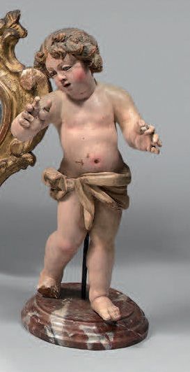 Statuette d'enfant en bois sculpté et peint,...