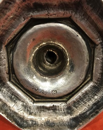Silver torch, the octagonal base, the shaft...