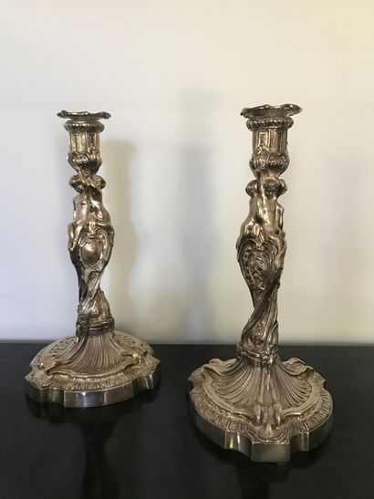 
NON VENU - A pair of silvered cast bronze...