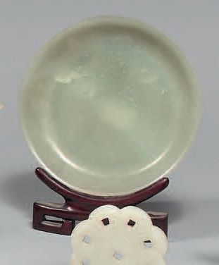 CHINE - XIXe siècle.
Celadon nephrite circular...