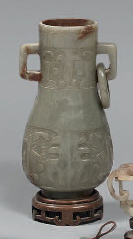 CHINE - XXe siècle.
A celadon and rust nephrite...