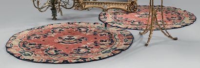 Pair of small round rugs from China, decorated...