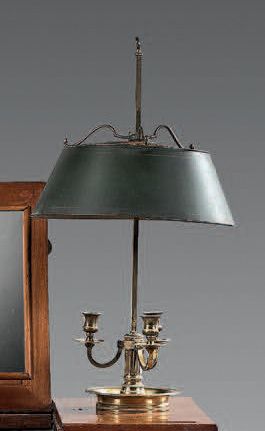 A three-light ormolu bouillotte lamp on a...